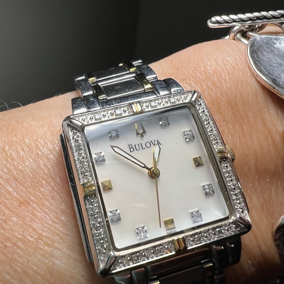 Ladies Bulova diamond accent watch with mother of pearl face. - Picture 1 of 9